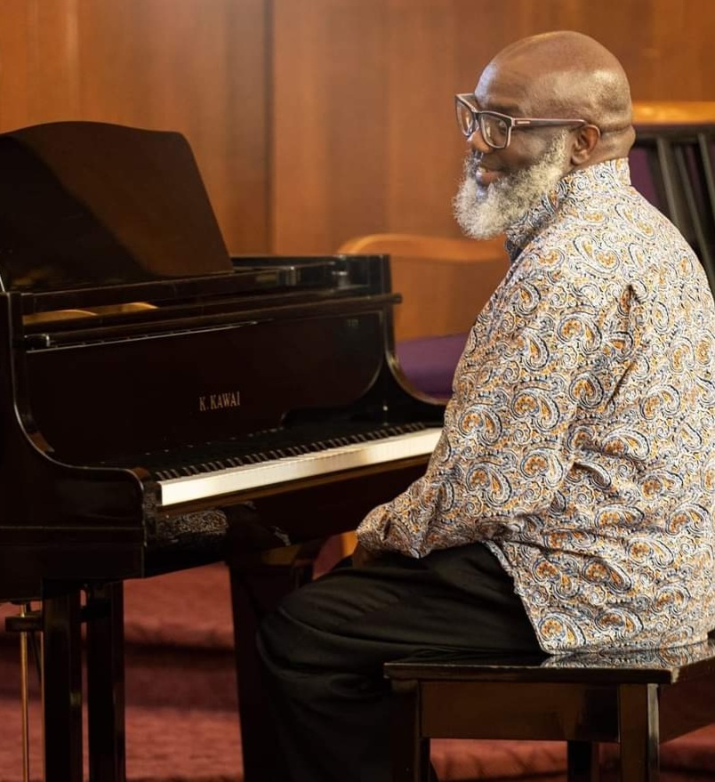 Picture of Reverend James Hamler at Piano